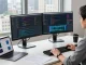 Innovative workspace with developer coding on dual monitors showcasing https://sc88.chat/ in a modern office environment.